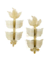 Pair of wall lamps of the series "Grand Hotel". 1950s. Leaf- and flower-shaped elements in blown incamiciato lattimo glass and glass with gold leaf application. (40x80 cm.) (slight defects)