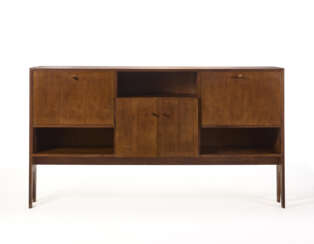 Custom-designed sideboard - bar cabinet. How, 1960s. Solid and veneered wooden frame. Three open and three storage compartments, the central one with double doors and the side ones with drop-downs. (210.5x118x45 cm.) (minor defects and small losses) 
