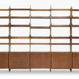 Custom-designed five-bay bookcase. 1960s. Solid and veneered wooden frame. Five two-door cabinets, fifteen hanging shelves, adjustable brass feet. (442.5x283x45.5 cm.) (slight defects) | | Provenance | Private collection, Como - photo 1