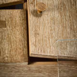 Tripod toilet with cabinet with one drawer and three door compartments. 1940. Solid and veneered bleached oak frame, tempered glass top. (100x66x71 cm.) (slight defects) | | Provenance | Casa F. Como | | Unique piece | | Literature | Luigi Zuc - Foto 7