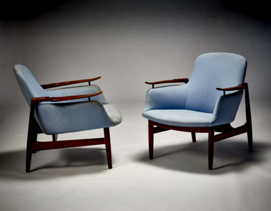 Pair of armchairs model "NV53". Execution by Niels Vodder,, 1953ca. Teak, brass and light blue fabric. (72x73.5x66 cm.) (defects and restorations) | | Literature | Noritsugu Oda, Danish Chairs, Tokyo 1996, ill. p. 99; | Michael Ellison, Leslie Pina - photo 1