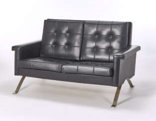 Sofa model "875". Produced by Cassina, Meda, 1960. Chromed steel frame, black leatherette upholstery. (140x77x89 cm.) (slight defects)