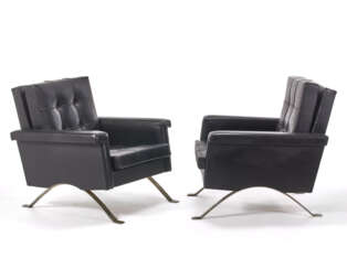 Pair of armchairs model "875". Produced by Cassina, Meda, 1960. Chromed steel frame, black leatherette upholstery. (81.5x77x89 cm.) (slight defects)