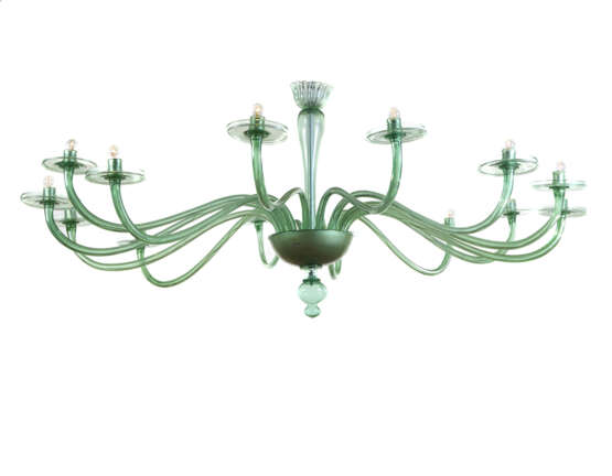 Large fourteen-arm chandelier. Execution by V.S.M. Cappellin Venini & C. 1921-25ca. Transparent light green blown glass. (h cm 195; d cm 230) | | The chandelier is referable to drawing no. 2011 and no. 2018 in the VSM Cappellin Venini catalogue and - фото 7