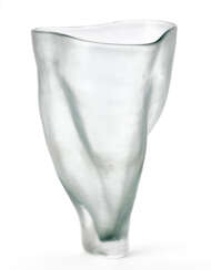 Large vase. Murano, 2004. Colourless and slightly greenish glass blown in the form of an irregular foil and finely beaten on the outer surface. Signed, located and dated with engraving under the base. (h 49.5 cm.; d 31 cm.) | | Provenance | Privat