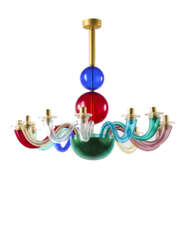 Twelve-arm chandelier. Execution by Venini, Murano, 1963. Transparent polychrome blown glass and gilded metal. Signed with engraving "Gio Ponti Venini 1963". (89x77 cm.) | | Provenance | Private collection, Italy | | Literature | Venini, catalog