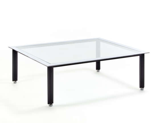 Coffe table of the series "T10 Fasce cromate". Produced by Azucena, Milan, 1957ca. Black lacquered metal frame, chromed feet, glass top with chromed metal perimeter. (120x40.2x100 cm.) (slight defects) | | Literature | Azucena. Mobili e oggetti, a - photo 1