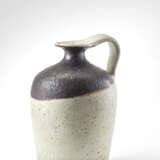 Small enamelled stoneware jug in shades of white and brown. 1970s. Signed under the base "Gambone Italy". (h 13.5 cm.) - photo 1