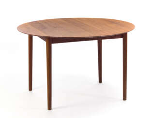 Round table with extension. Produced by Søborg Møbler, Denmark, 1960s. Solid teak wooden frame. Bearing manufacture's mark not legible and the inscription "Made in Denmark". (h 73.3 cm.; d 124.5 cm.)