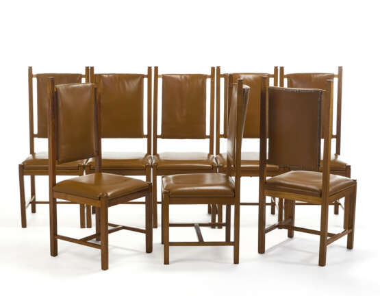 Eight high-backed chairs designed for the dining room. How, 1970s. Solid wood, seat and back upholstered in brown leather. (46x110.5x50 cm.) (slight defects) | | Provenance | Private collection, Como - photo 1