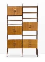 Two-bay bookcase with eight doors, five drawers and several shelves. Italy, 1960s. Solid and veneered wood. (163x277x41.5 cm.) (slight defects)