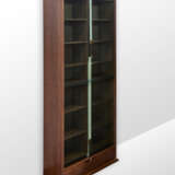 Bookcase model "Zibaldone". Produced by Bernini, Italy, 1974. Solid and veneered wood, green glass doors sliding vertically on counterweighted straps. (116x258x40 cm.) (slight defects) | | Literature | G. Gramigna, Repertorio del design italiano 19 - фото 2