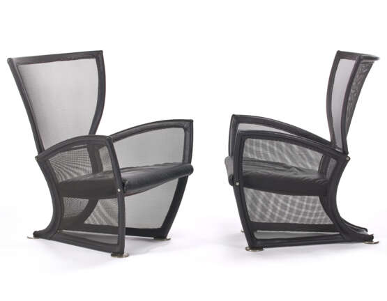 Pair of armchairs model "Privè". Produced by Alias, Italy, 1980s. Tubular steel and carbon mesh frame, hand-sewn leather cushion and edging. (80x110x86 cm.) | | Literature | G.Gramigna Design Italiano 1950-2000. Allemandi - Foto 2