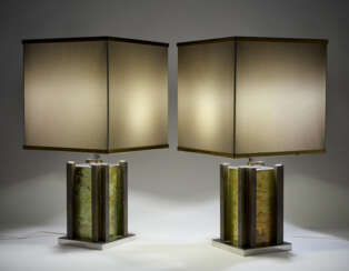 Pair of brass and chromed metal table lamps. Fabric lampshade. Rome, 1970s. Signed and marked. (33.5x64 cm.)