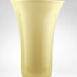 Vase of the series "Opalini". 1996. Lattimo and yellow incamiciato blown glass with applied base. Bearing label, signed with engraving under the base. (h 37 cm.; d 25 cm.) - Maintenant aux enchères