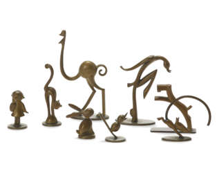 Lot of eight small brass sculptures depicting animals and stylised characters, made by the Werkstatte Hagenauer manufactory. Vienna, 1930s/1940s. (h max cm 14 ) (slight defects)