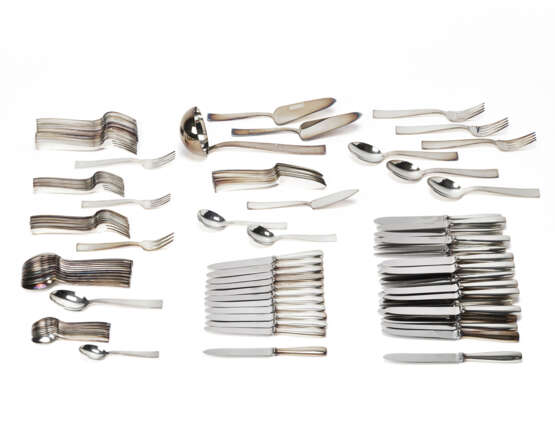 Stainless steel cutlery set consisting of twenty-four forks and twenty-four knives, twelve spoons, twelve forks and twelve knives for fish, twelve forks and twelve knives for fruit, twelve coffee spoons and eleven serving spoons. In original cloth ca - photo 1