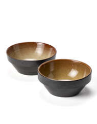 Pair of ceramic bowls painted in black. Execution by Ceramica Arcore,, 1970s. (h 6.4 cm.; d 8.5 cm.)