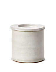 Vase with lid. Execution by Ceramica Arcore, Italy, 1970s. Ceramic enamelled in white. (h 12.5 cm.; d 13 cm.)