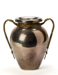 Large double-handled silver-plated and gilded metal vase. Milan, second half 20th century. Engraved mark under the base. (h 55 cm.) (slight defects)