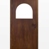 Dark wooden door with glass lunette. Dark brown bakelite handles. Milan, 1932. (101x202.5 cm.) (defects) | | Provenance | Andreani Apartment, via Monte Velino, Milan - Foto 1