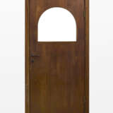 Dark wooden door with glass lunette. Dark brown bakelite handles. Milan, 1932ca. (101x201 cm.) (defects) | | Provenance | Andreani Apartment, via Monte Velino, Milan - фото 1