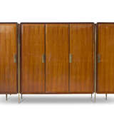 (Attributed) | Five-door cabinet. Turin, 1950s/1960s. Solid and veneered wood, brass tubular uprights, brass handles. (300x185x64 cm.) (slight defects) - фото 1