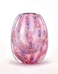 Blue amethyst and lattimo crystal sommerso glass vase, decorated with murrine and zanfirico canes and gold dust inclusion. Murano, 1963. Signed and dated with engraving under the base. (h 20 cm.)
