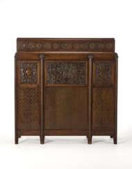 Cabinet with three doors and a flap made of wood carved with geometric plant motifs and a central cupboard. 1920s. (137x141x41 cm.) (defects and one missing key)