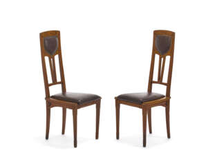 Pair of Liberty chairs. Milan, early 20th century. Solid wood carved, threaded and inlaid with different woods. Seat and back covered in brown leather. (41x100x42 cm.) (slight defects)