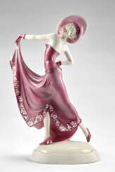 Sculpture depicting dancer. 1930s/1940s. Cast ceramic painted in pink and white under glaze. Marked with the manufacture's monogram and inscribed "AB94". (h max 35 cm.)