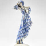 Sculpture depicting dancer model "6229". Execution by Goldscheider,, 1930s/1940s. Cast ceramic painted in light blue and polychrome under glaze. Mark of the manufacture and numerals under the base. (h max 25 cm.) (slight defects and restoration) | | - photo 2