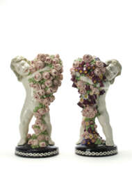 Two sculptures depicting a putto with roses and a putto with flowers and roses. Execution by Bernhard Bloch, Austria, 1915ca. Cast ceramic enamelled in polychromy under glaze. Marked with the manufactory monogram and engraved numerals 10 45 988 and 1
