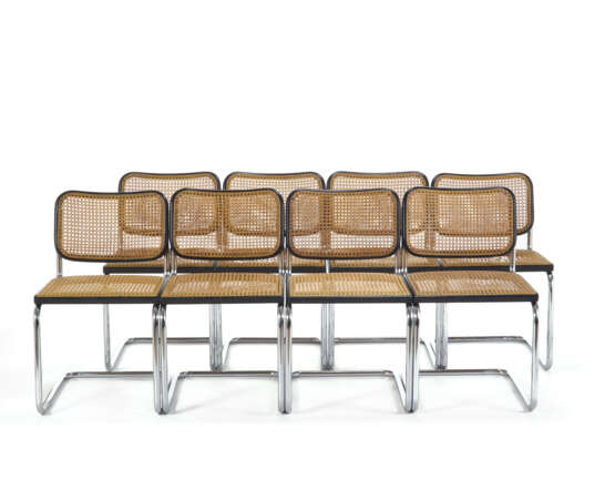 Eight chairs model "Cesca". Produced by Gavina, Italy, 1970s. Curved tubular metal, wooden-edged seat and backrest. Some specimens bear the manufacture's label. (47x79x57 cm.) (defects) - Foto 1