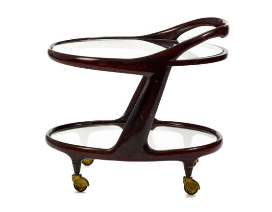 (Attributed) | Serving trolley. Italy, 1950s. Solid mahogany frame and glass tops. (72x35x52.5 cm.) (slight defects) - фото 1