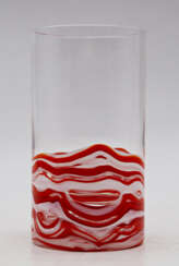 Vase of the series "Messico". Murano, 1967-1968ca. Crystal, red opaque and lattimo sommerso blown glass. Signed by engraving "Venini Italia". (h 18.3 cm.; d 10 cm.)