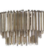 Venini & Cо. Large chandelier of the series "Trilobo". Murano, 1970s. Metal rod frame, transparent yellow and lattimo submerged glass pendants. (h 45 cm.; d 90 cm.) (defects and losses)