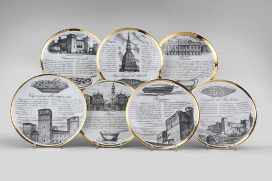 Seven plates of the series "Specialità torinesi". Milan, 1960s. Porcelain, black and gold lithographic print. Marked on verso. (d 24 cm.) (slight defects) - photo 2