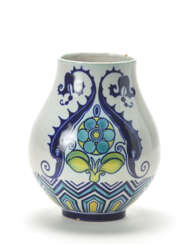Bulb-shaped enamelled ceramic vase with cobalt blue, light blue, yellow and green geometric decorations and with two tritons and flower on a white under glaze background. Mugello, 1920s. Marked in blue under the base: "CHINI E C / MUGELLO / (ITALIA)"