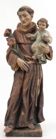 Heiligenfigur "Heiliger Antonius mit Kind auf dem Arm, in der anderen Hand eine Blume haltens" , Ende 19. Jh., Holz vollplastisch geschnitzt, farbig gefaßt, auf rechteckiger Holzplinthe, Gebrauchspuren, H. 62 c… - фото 1