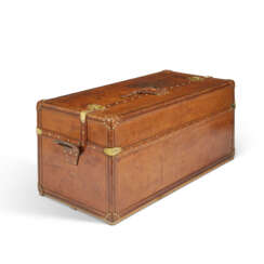 A NATURAL COWHIDE LEATHER IDEAL TRUNK WITH BRASS HARDWARE