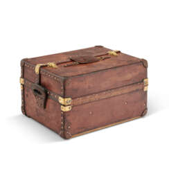 A NATURAL COWHIDE LEATHER IDEAL TRUNK WITH BRASS HARDWARE