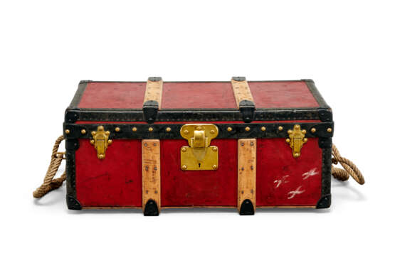 A RED VUITTONITE CANVAS TRUNK WITH BRASS HARDWARE - photo 2