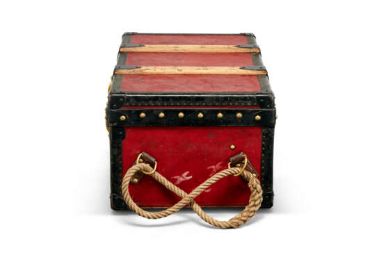 A RED VUITTONITE CANVAS TRUNK WITH BRASS HARDWARE - photo 5