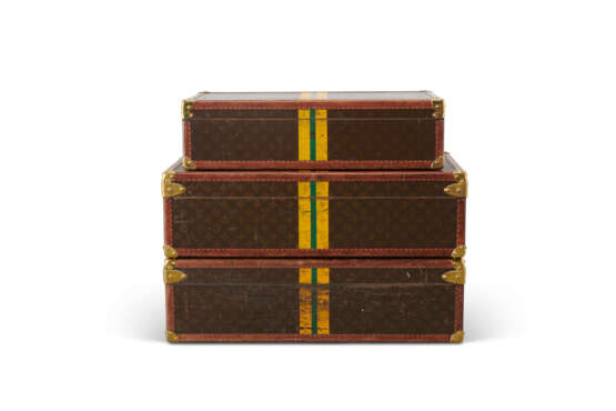 A GROUP OF THREE: A MONOGRAM CANVAS LEATHER BLISTEN 75 & TWO ALZER 75 SUITCASES WITH BRASS HARDWARE - photo 6