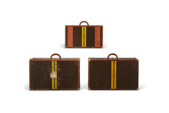 A GROUP OF THREE: A MONOGRAM CANVAS LEATHER BLISTEN 75 & TWO ALZER 75 SUITCASES WITH BRASS HARDWARE - photo 7