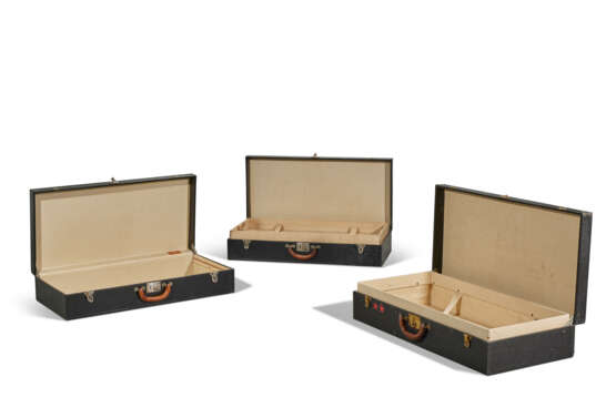 A GROUP OF THREE: A BLACK VUITTONITE CANVAS STACKABLE CAR TRUNKS WITH BRASS HARDWARE - photo 3