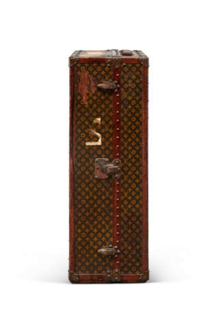 A MONOGRAM CANVAS WARDROBE TRUNK WITH BRASS HARDWARE - photo 3