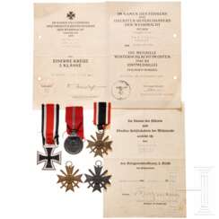 Urkunden und Auszeichnungen eines Obergefreiten im AR 137