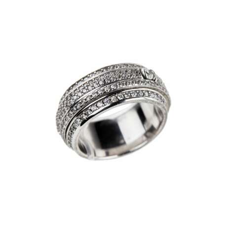 Ring with Swarovski crystals. ----White metal ring with Swarovski rhinestones. Ring with two freely rotating parts in the center of the ring. Rhinestones are located around the rim of the ring. Product size: 15 Metal 20th century - photo 2